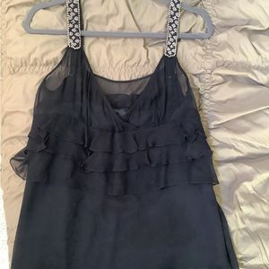 Cocktail top size M runs small